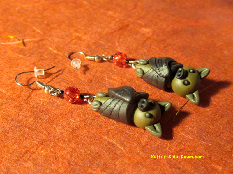 Red and black bead accents.