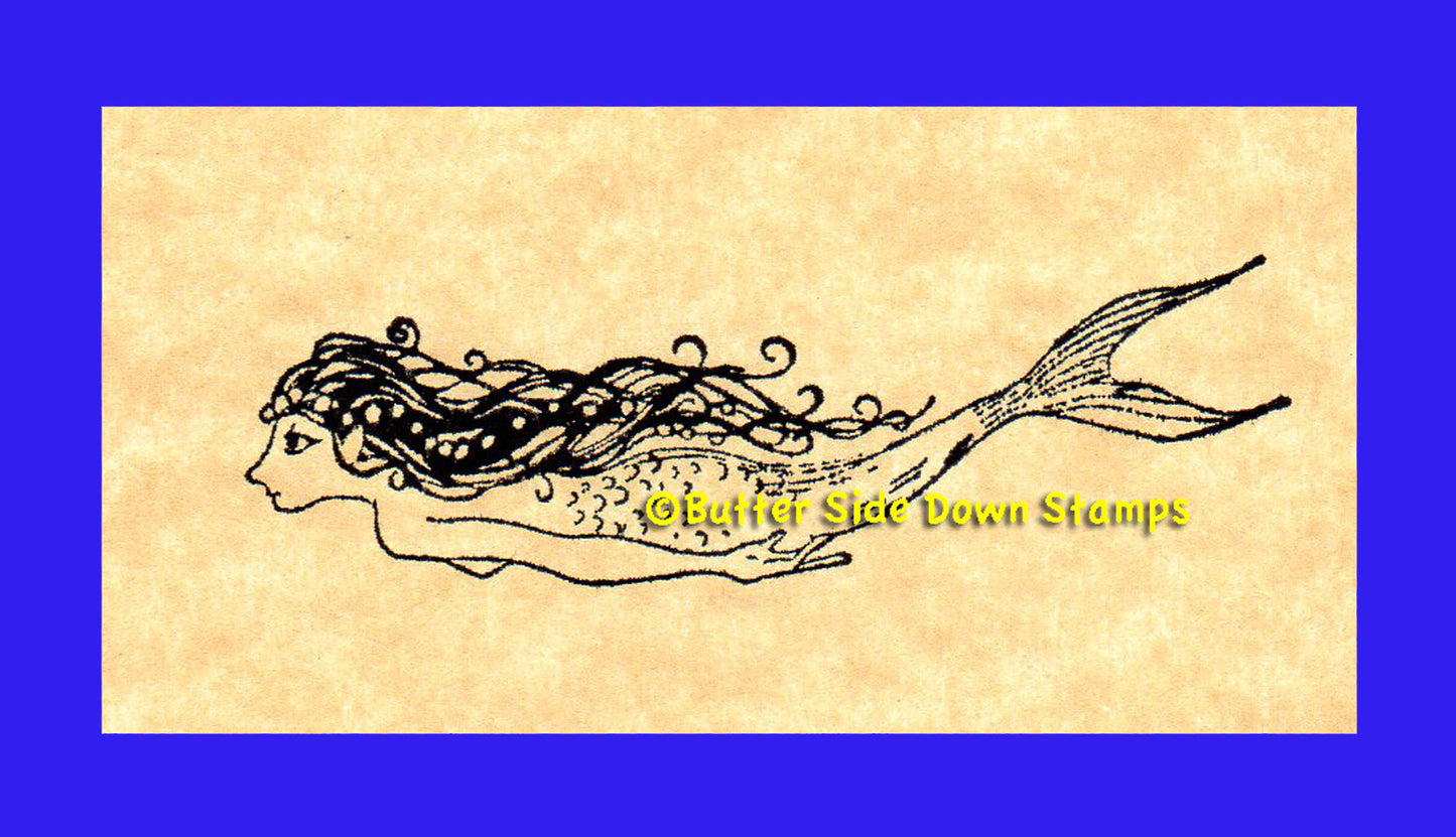 Graceful swimming mermaid rubber stamp.