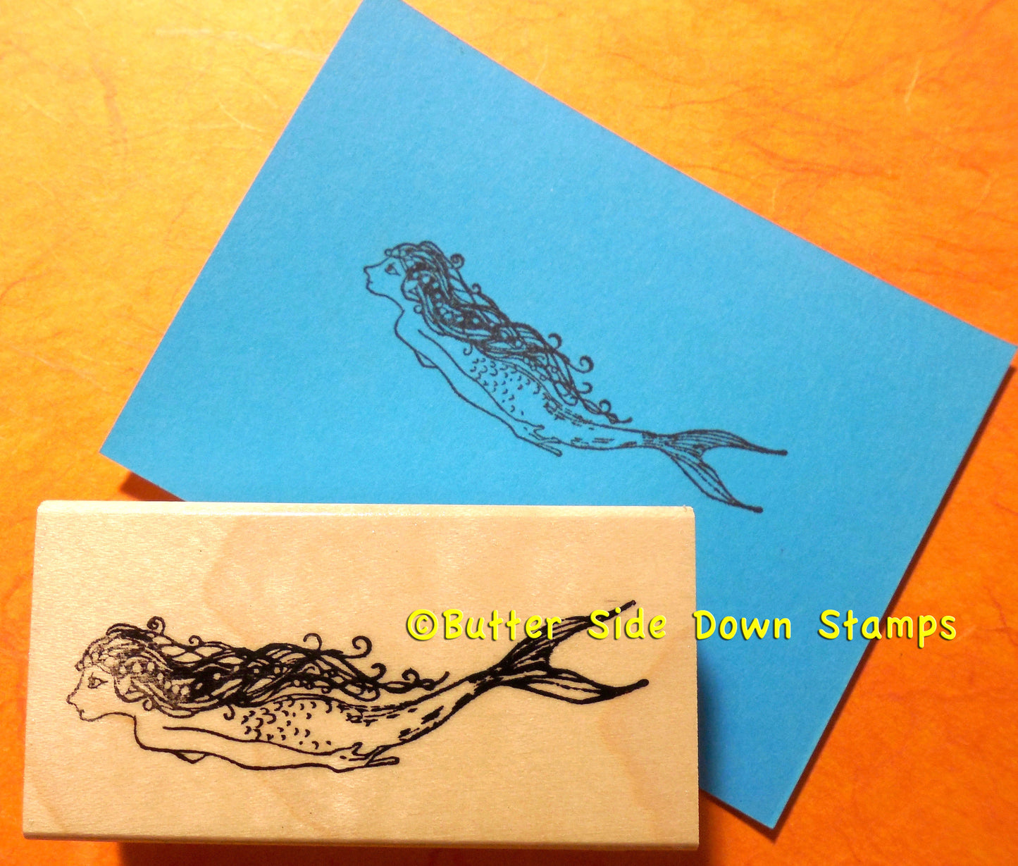 Swimming mermaid sample stamped image.