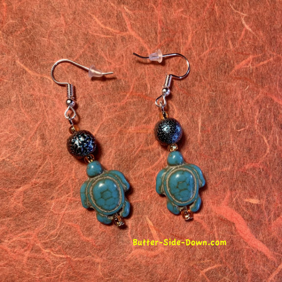 Blue sea turtle earrings.