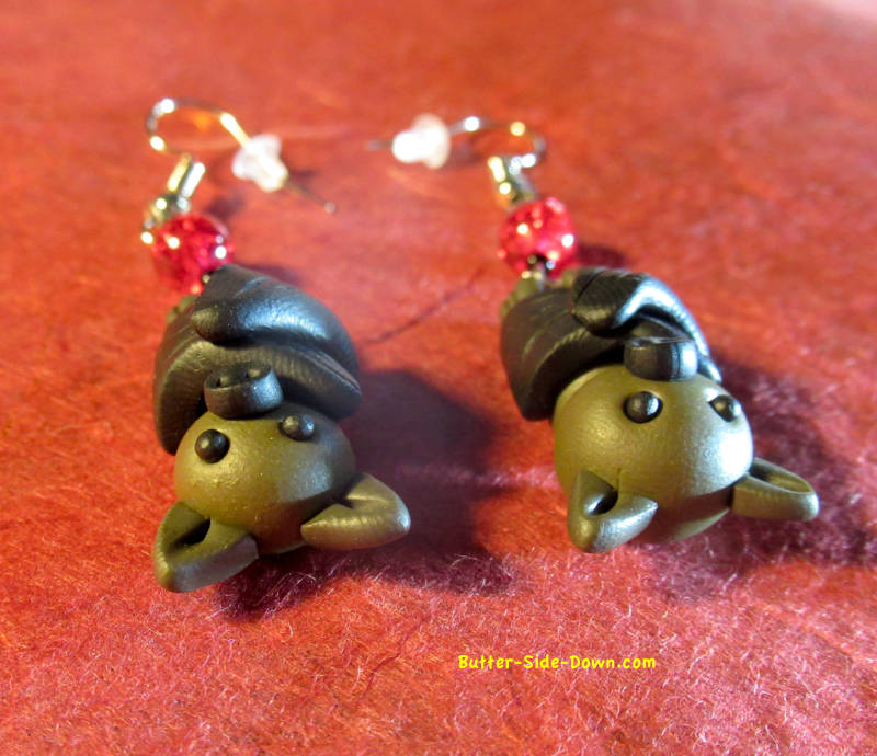Close up of polymer clay fruit bats.