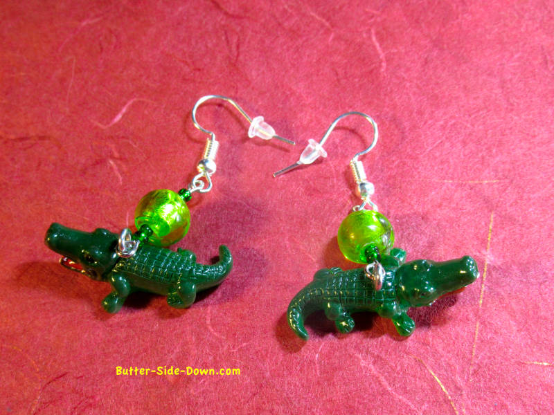 Alligator and lampwork bead earrings.